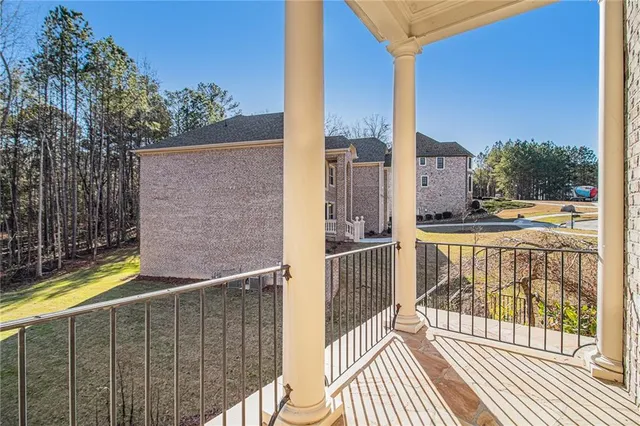 an aerial view of a house with a garden