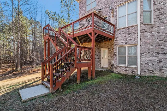 a view of a room with wooden walls