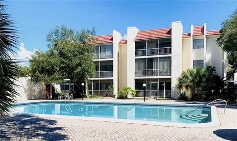 642 Northwest 13th Street, Unit 210 Boca Raton, FL 33486 - Photo 1 of 17 a front view of house with yard