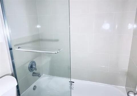 642 Northwest 13th Street, Unit 210 Boca Raton, FL 33486 - Photo 15 of 17 a bathroom with a shower