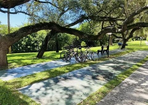 642 Northwest 13th Street, Unit 210 Boca Raton, FL 33486 - Photo 16 of 17 a view of a park with large trees