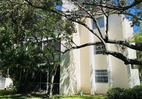 642 Northwest 13th Street, Unit 210 Boca Raton, FL 33486 - Photo 17 of 17 a view of outdoor space and yard