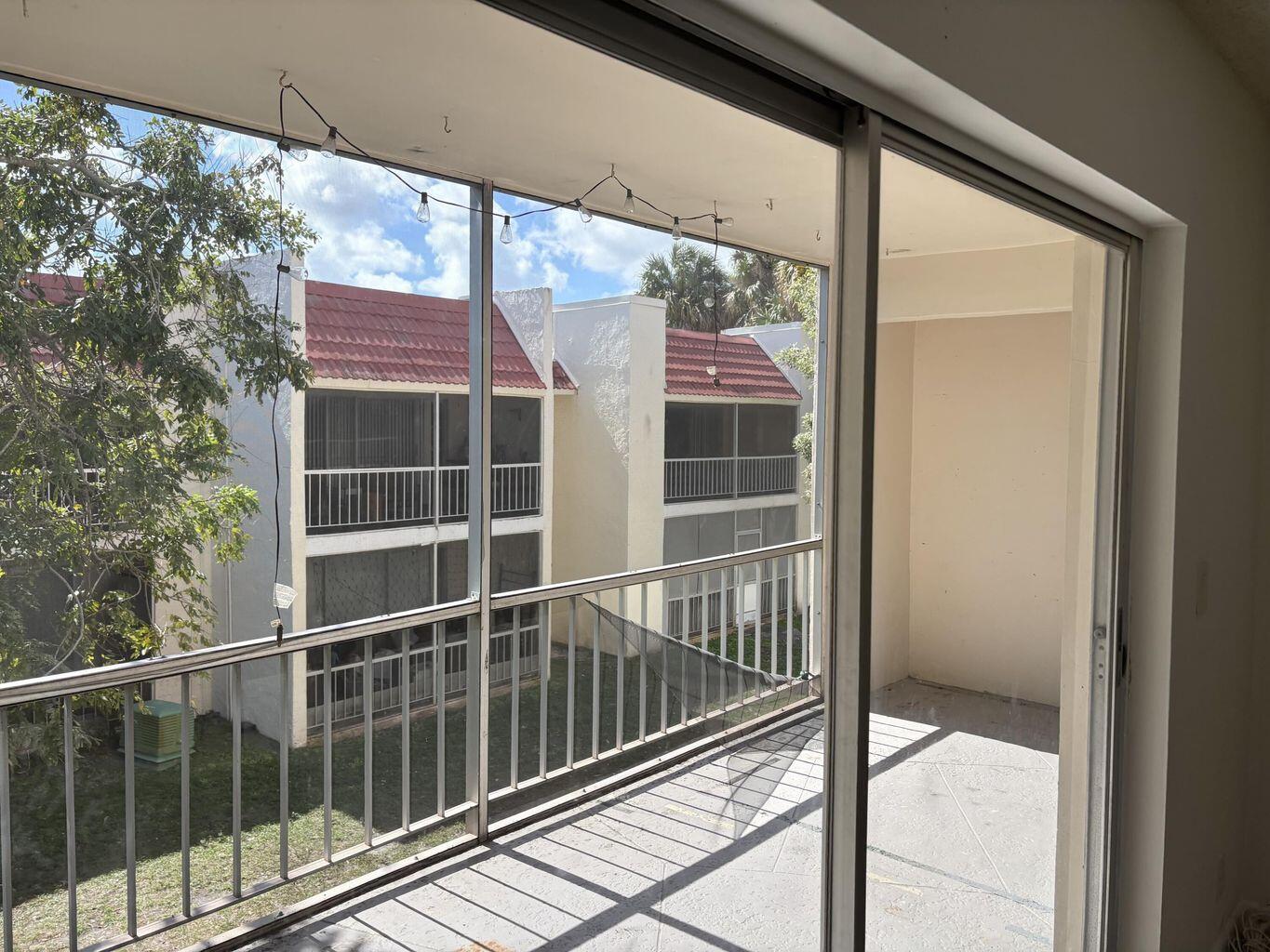 642 Northwest 13th Street, Unit 210 Boca Raton, FL 33486 - Photo 4 of 17 a view of a balcony