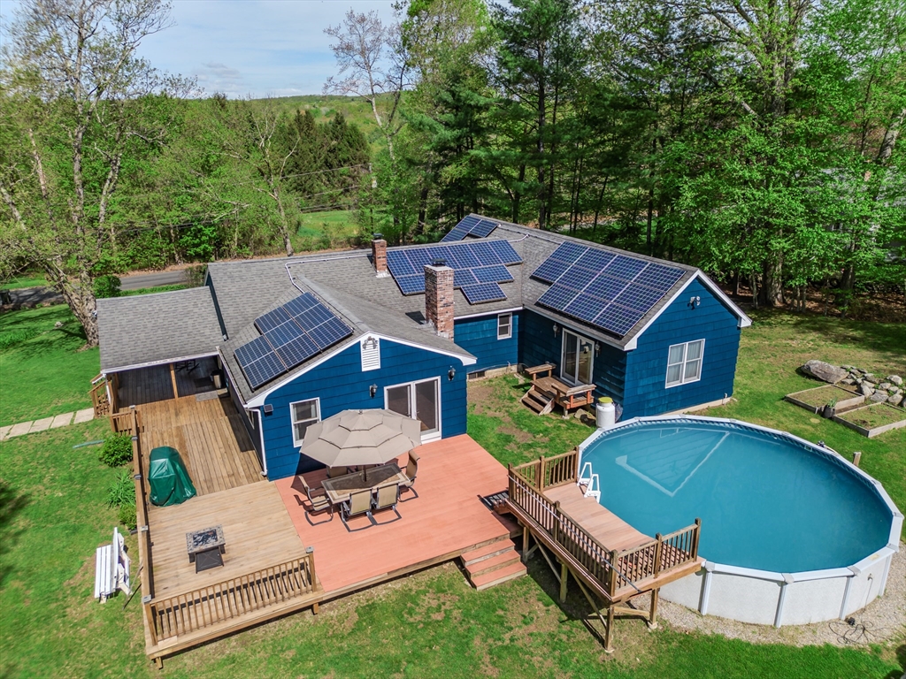 48 Ames Road Hampden, MA 01036 - Photo 18 of 42 an aerial view of a house with swimming pool garden and patio