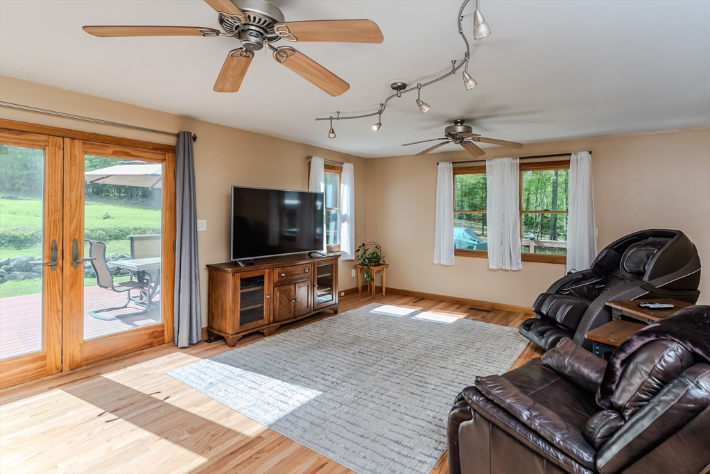 48 Ames Road Hampden, MA 01036 - Photo 19 of 42 a living room with furniture and a flat screen tv