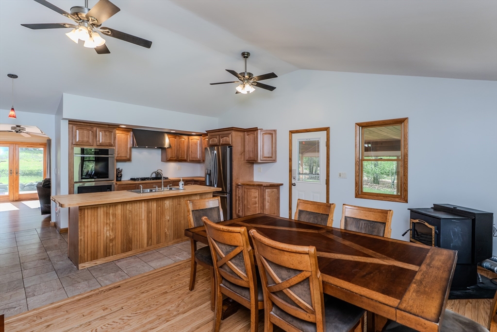 48 Ames Road Hampden, MA 01036 - Photo 24 of 42 a view of a dining room with furniture window and wooden floor