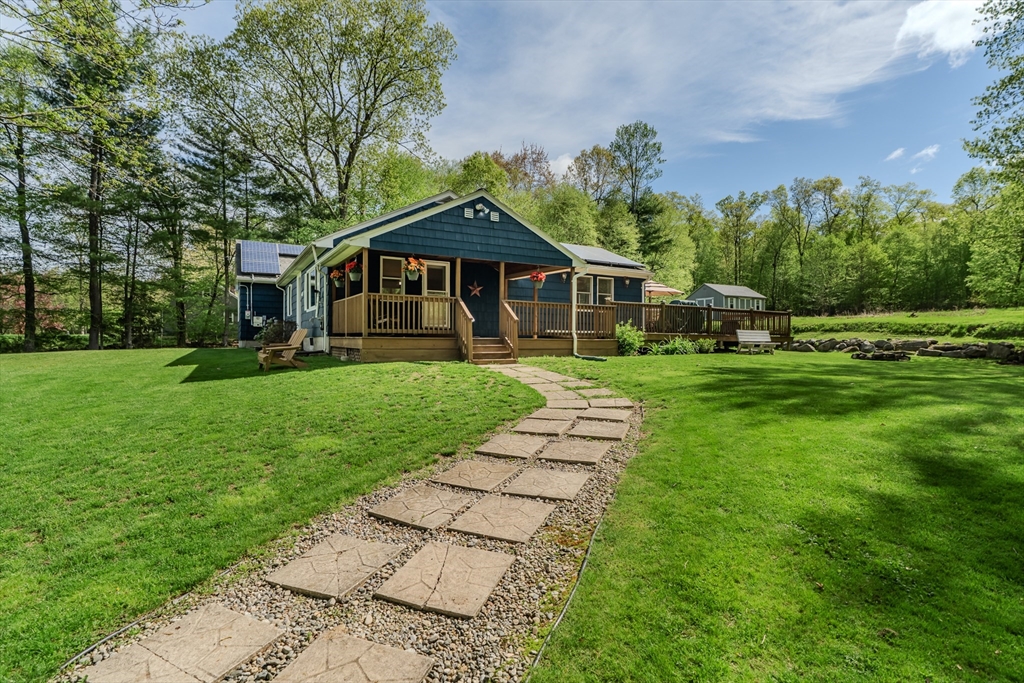48 Ames Road Hampden, MA 01036 - Photo 6 of 42 a front view of a house with a yard