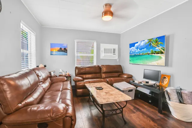 a workspace with furniture and window