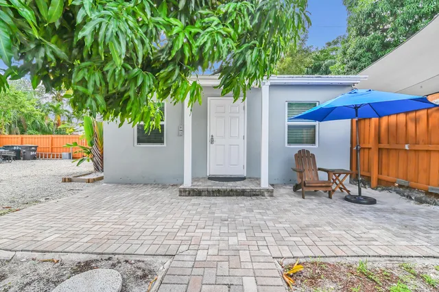 a backyard of a house with seating space