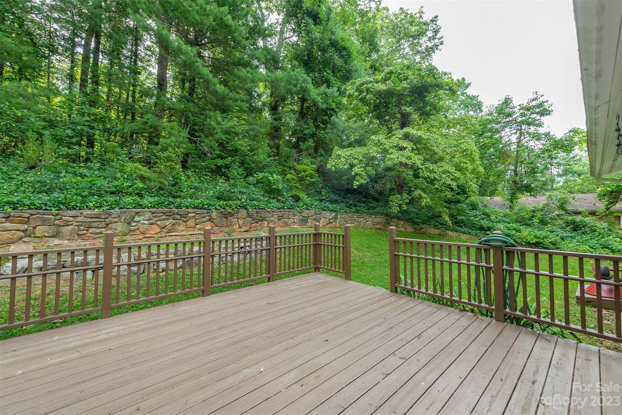 92 Alpine Way Asheville, NC 28805 - Photo 14 of 22 a balcony with wooden floor