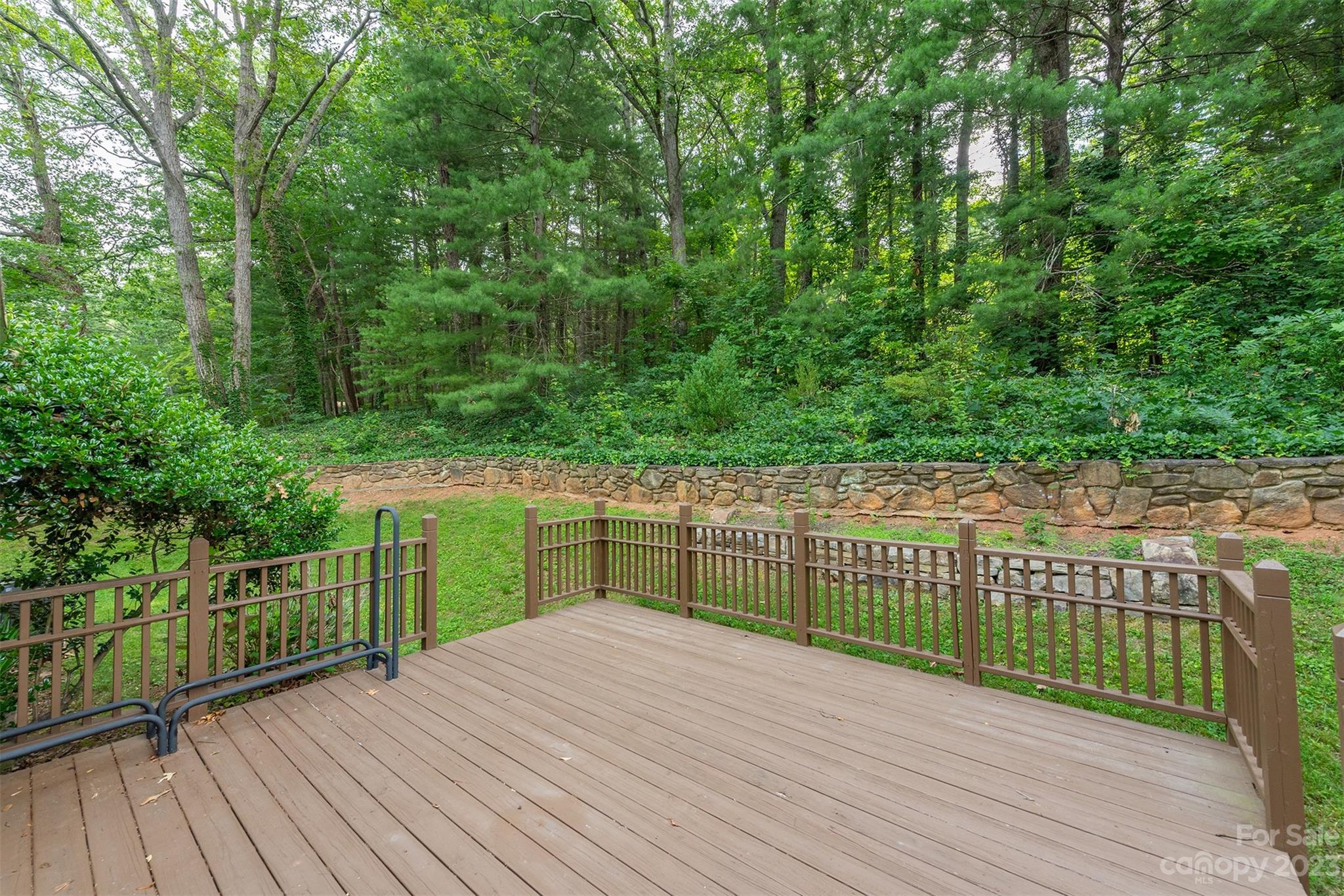 92 Alpine Way Asheville, NC 28805 - Photo 2 of 22 a balcony with wooden floor