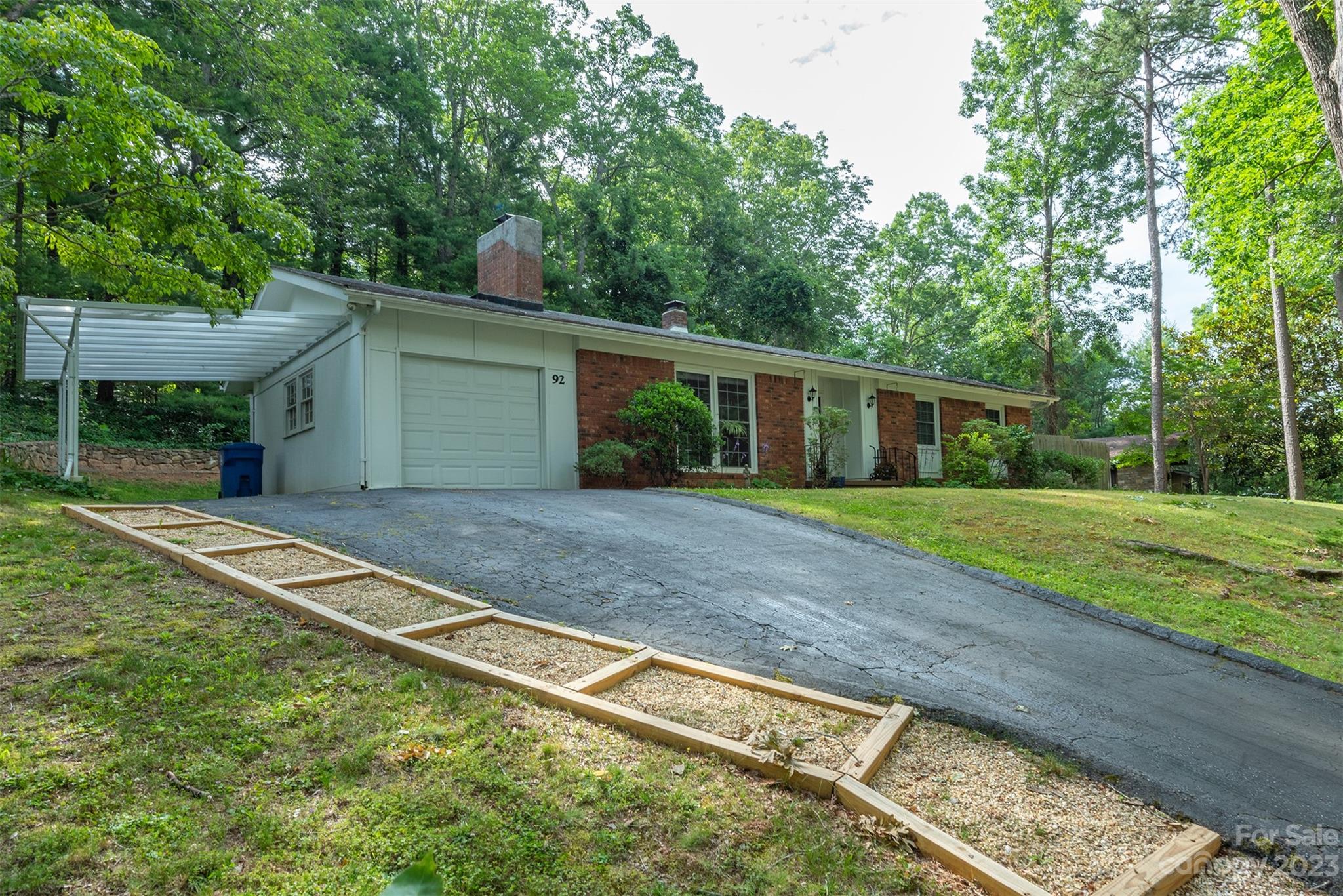 92 Alpine Way Asheville, NC 28805 - Photo 21 of 22 a view of house with backyard and tree