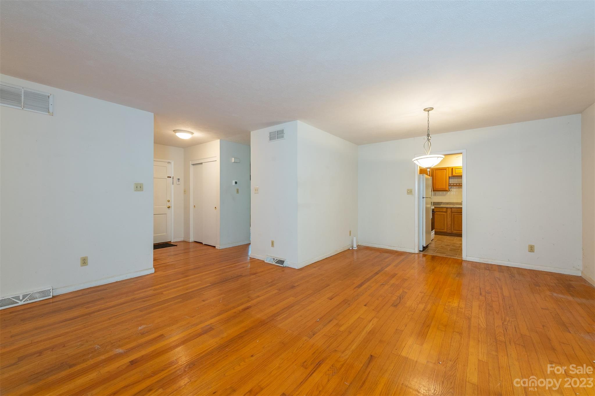 92 Alpine Way Asheville, NC 28805 - Photo 8 of 22 a view of an empty room with wooden floor