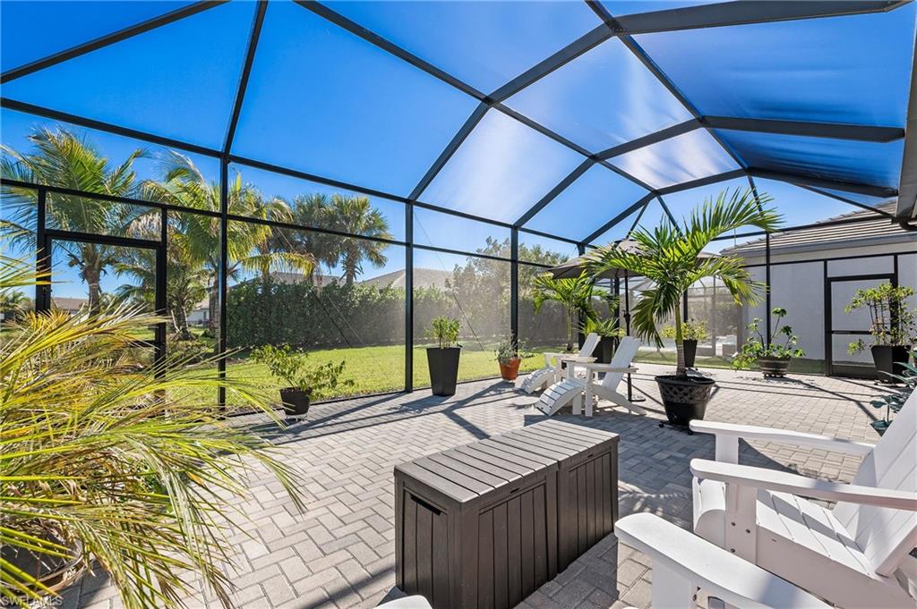 11488 Coronado Way Naples, FL 34120 - Photo 35 of 50 a view of an outdoor kitchen