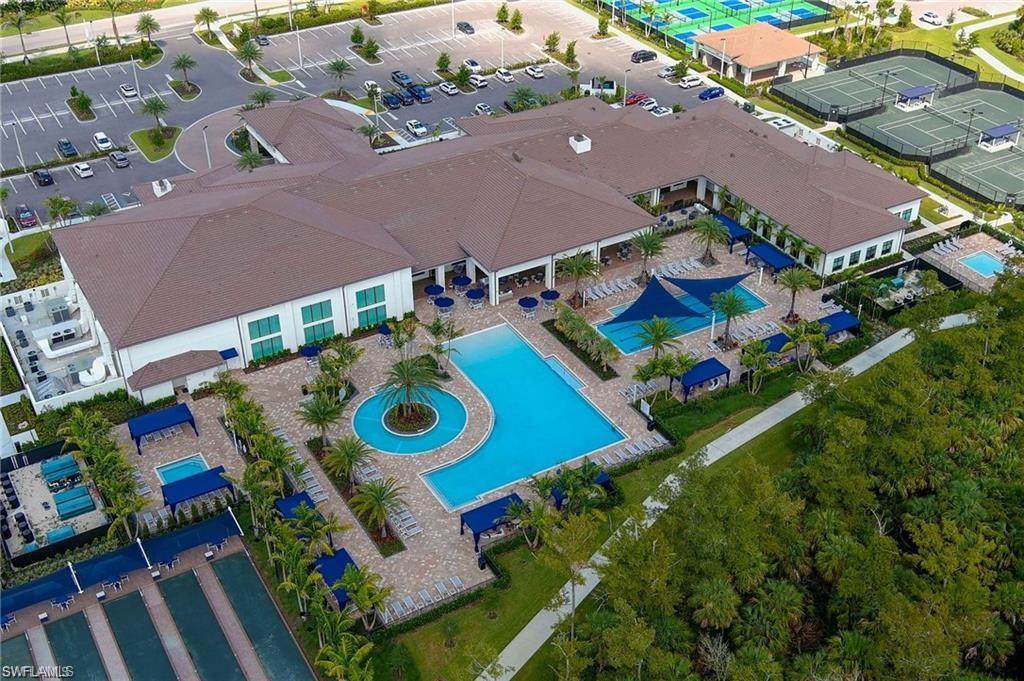 11488 Coronado Way Naples, FL 34120 - Photo 49 of 50 an aerial view of a house an outdoor space and sitting area