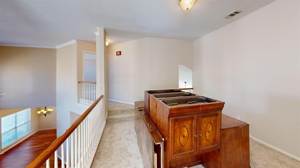 442 Spring Air Drive Allen, TX 75002 - Photo 19 of 27 a view of a hallway with staircase