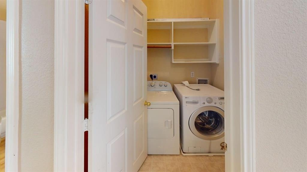442 Spring Air Drive Allen, TX 75002 - Photo 24 of 27 a utility room with dryer and washer