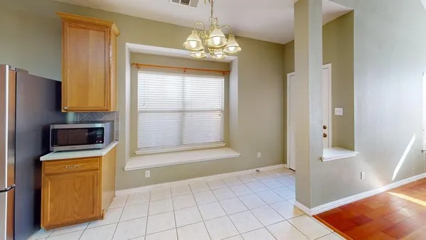 a view of kitchen and utility room