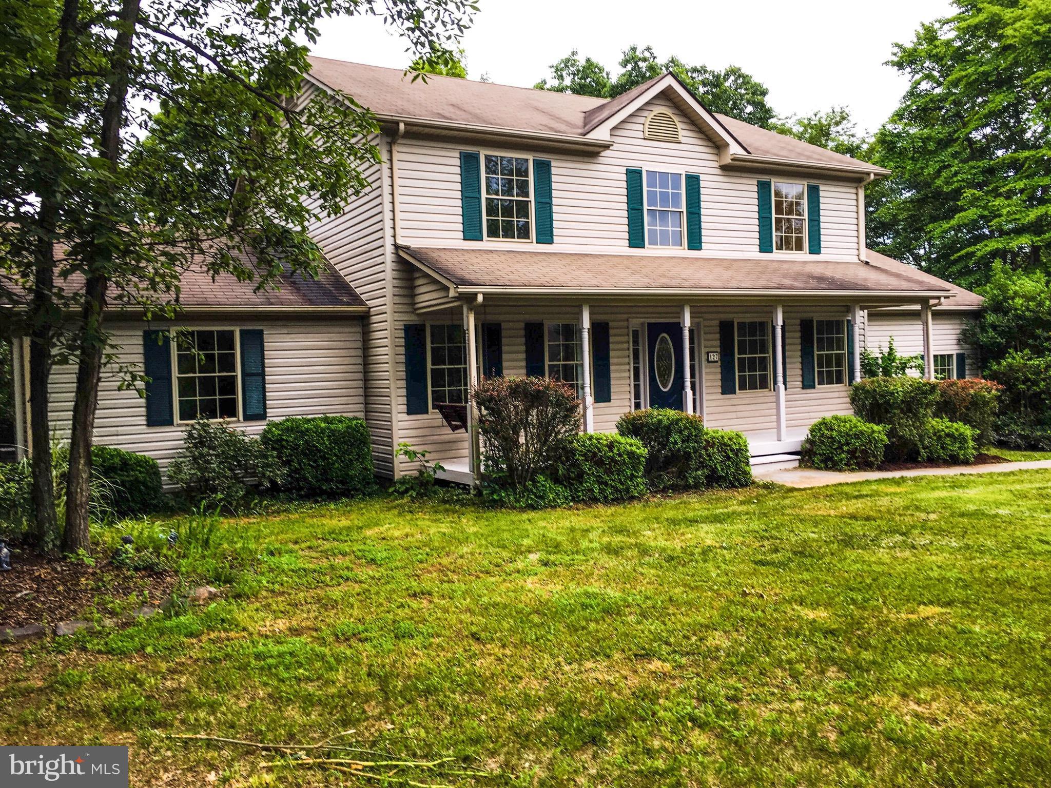 127 Holiday Road Cross Junction, VA 22625 - Photo 2 of 29 a view of a house with a yard and potted plants