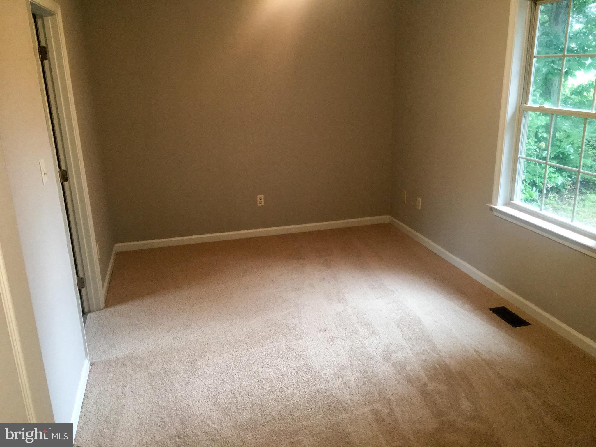 127 Holiday Road Cross Junction, VA 22625 - Photo 16 of 29 an empty room with a window