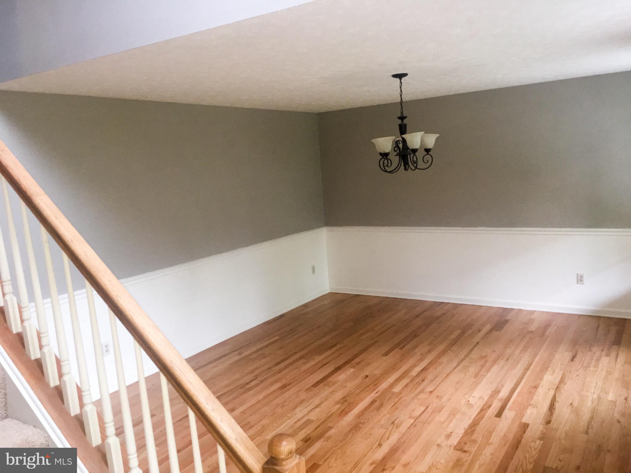 127 Holiday Road Cross Junction, VA 22625 - Photo 19 of 29 a view of a room with wooden floor and stairs