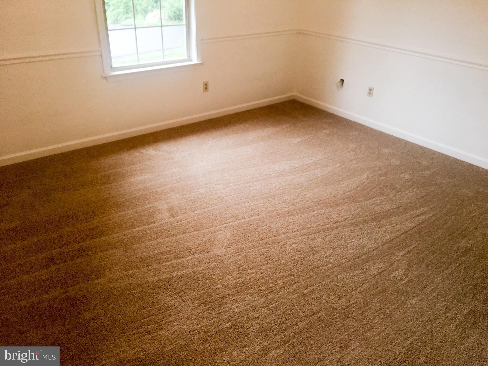 127 Holiday Road Cross Junction, VA 22625 - Photo 24 of 29 an empty room with a natural light