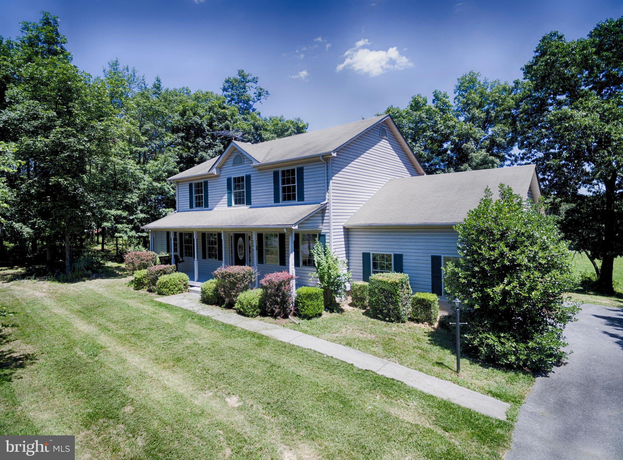 127 Holiday Road Cross Junction, VA 22625 - Photo 28 of 29 a front view of a house with garden