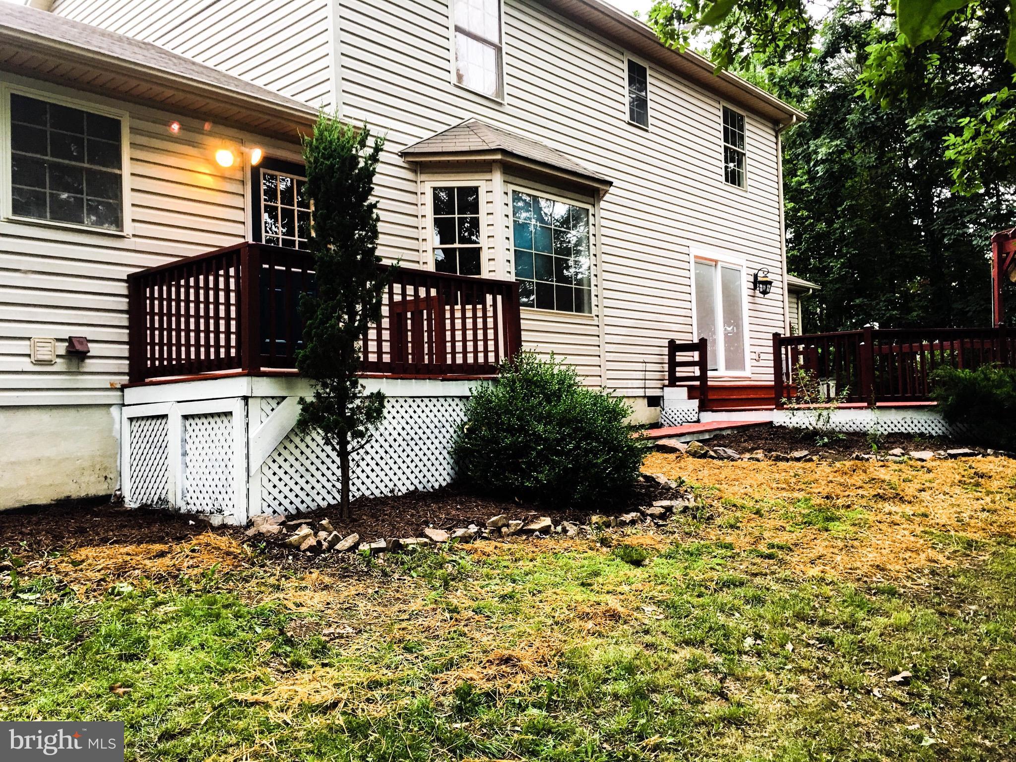 127 Holiday Road Cross Junction, VA 22625 - Photo 5 of 29 a front view of a house with a yard