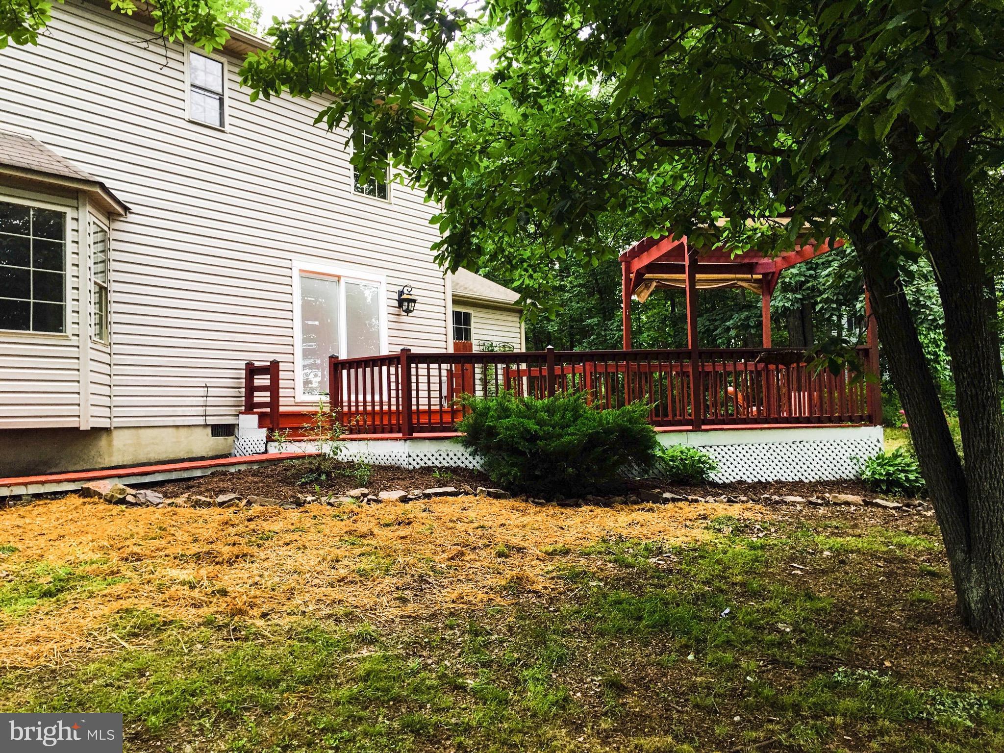 127 Holiday Road Cross Junction, VA 22625 - Photo 6 of 29 a view of a house with backyard and sitting area