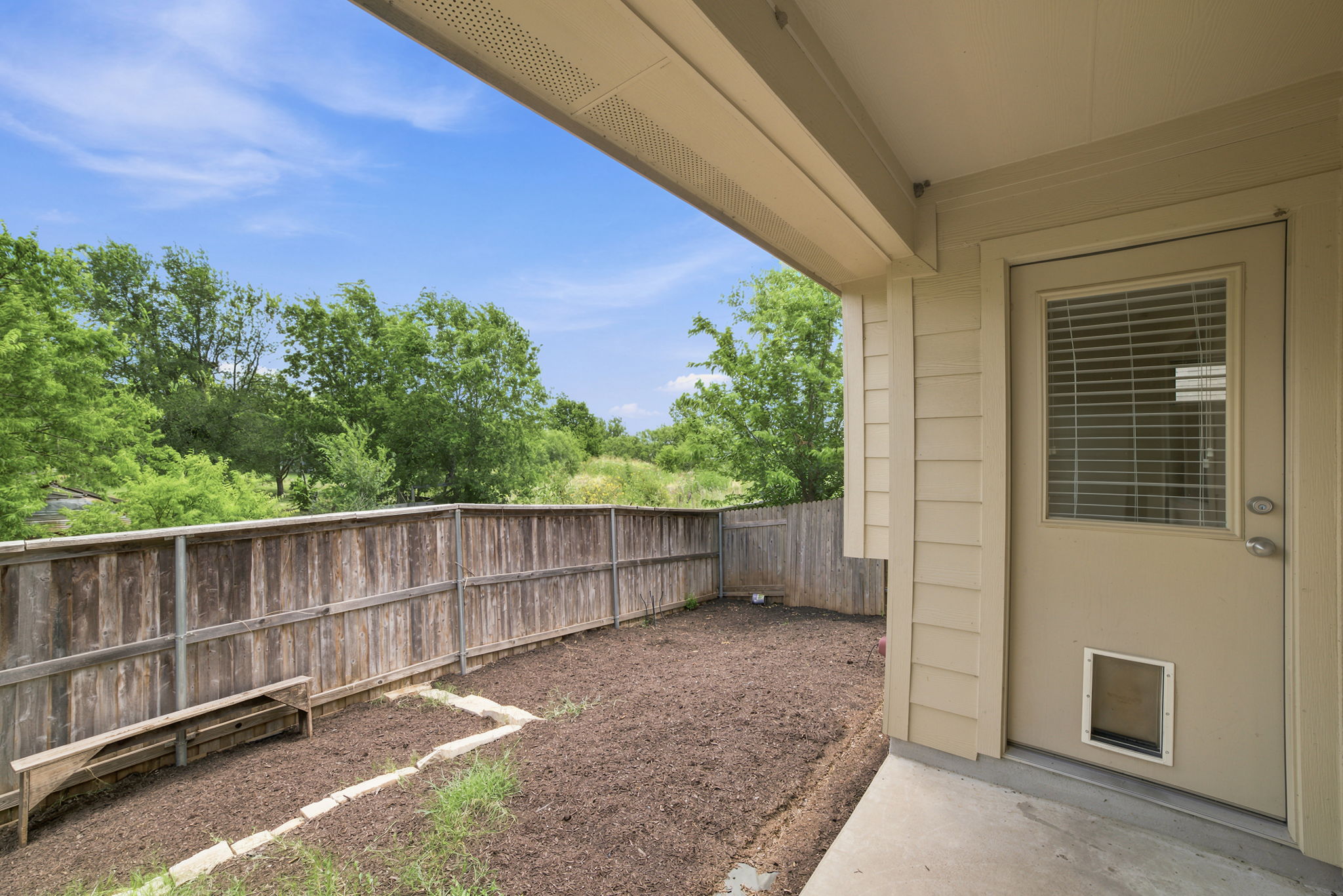514 Nautical Loop Kyle, TX 78640 - Photo 23 of 24 A fully fenced backyard offers a private outdoor sanctuary, perfect for quiet enjoyment or lively gatherings.