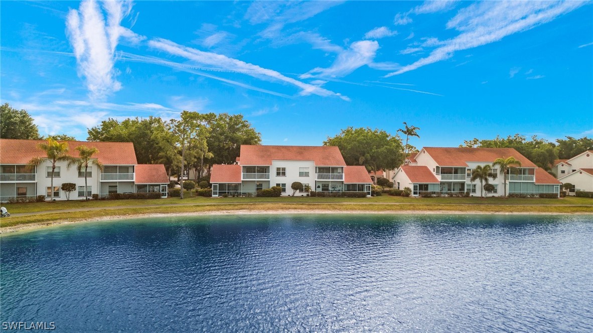 637 Windsor Square, Unit 102 Naples, FL 34104 - Photo 26 of 36 a view of an swimming pool and outdoor space