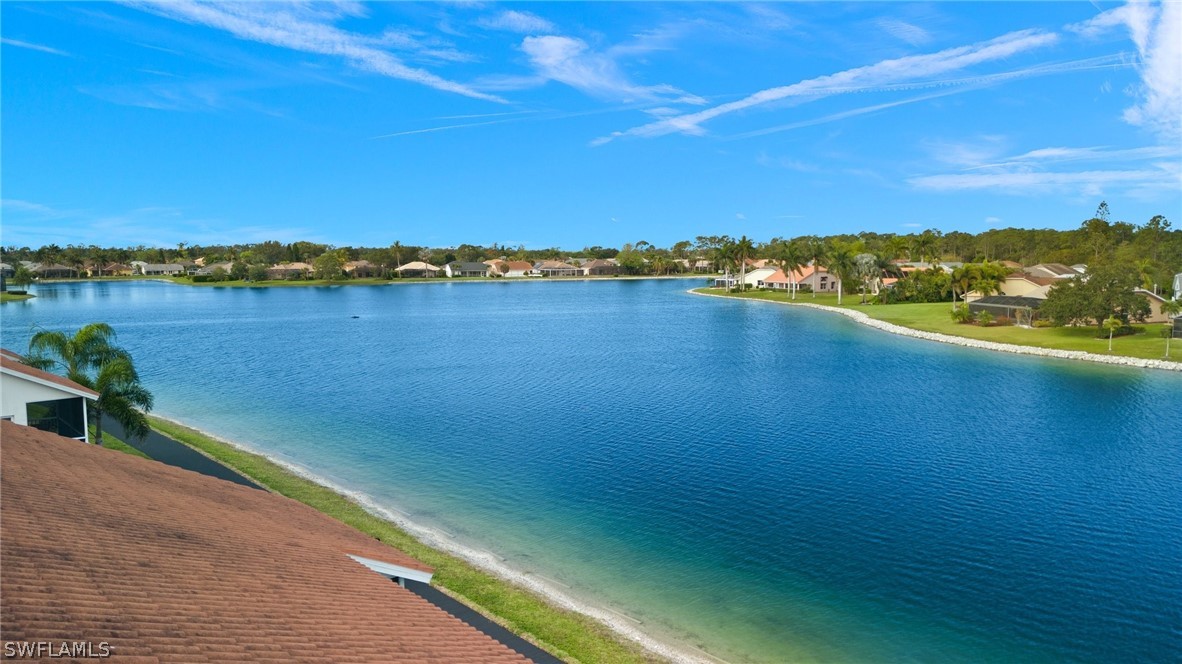 637 Windsor Square, Unit 102 Naples, FL 34104 - Photo 28 of 36 a view of an ocean and beach
