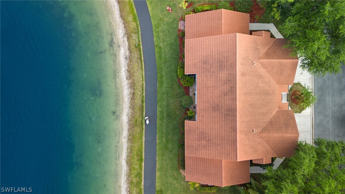 637 Windsor Square, Unit 102 Naples, FL 34104 - Photo 32 of 36 an aerial view of a house with a yard