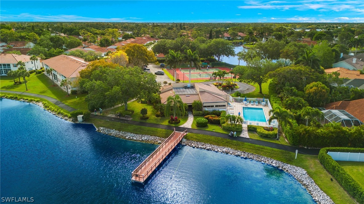 637 Windsor Square, Unit 102 Naples, FL 34104 - Photo 35 of 36 an aerial view of a house with a yard