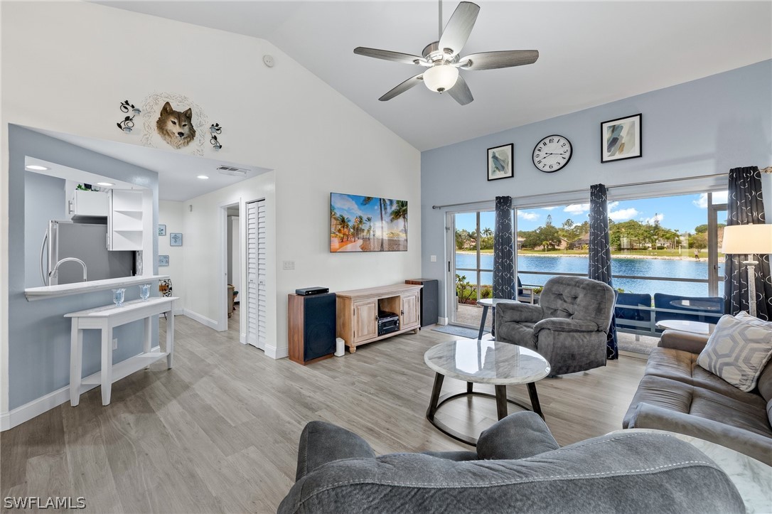 637 Windsor Square, Unit 102 Naples, FL 34104 - Photo 5 of 36 a living room with furniture