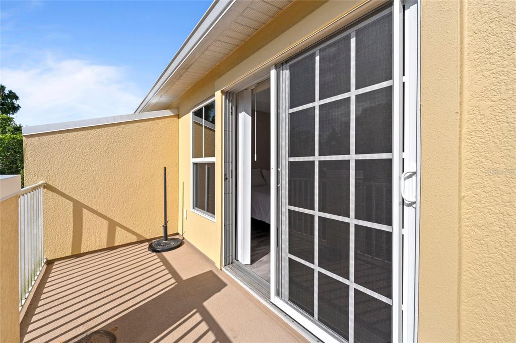 8825 White Sage Loop Lakewood Ranch, FL 34202 - Photo 24 of 33 a view of outdoor space with wooden floor and windows