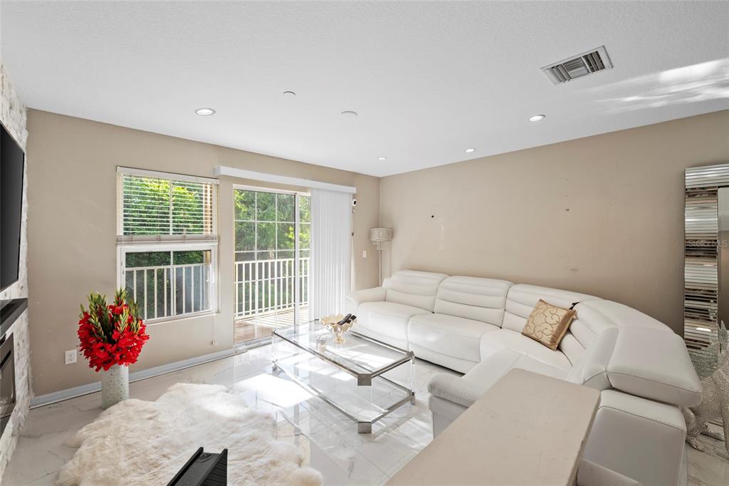 8825 White Sage Loop Lakewood Ranch, FL 34202 - Photo 3 of 33 a bed room with a bed and a chair