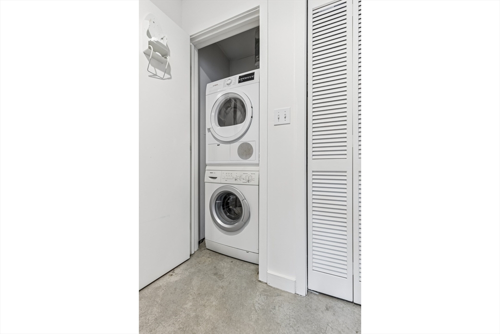 139 East Berkeley Street, Unit 402R Boston, MA 02118 - Photo 14 of 17 a utility room with dryer and washer