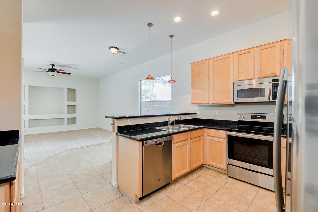3213 West Sentinel Rock Road Phoenix, AZ 85086 - Photo 7 of 22 Kitchen 1