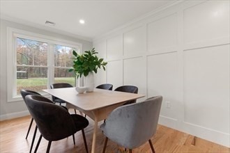 32 Barracks Road, Unit 32 Hudson, MA 01749 - Photo 6 of 16 a view of a dining room with furniture and a window