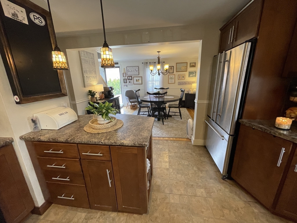 12 Hendricks Street Avon, MA 02322 - Photo 12 of 19 a spacious bathroom with a granite countertop sink a mirror and a shower
