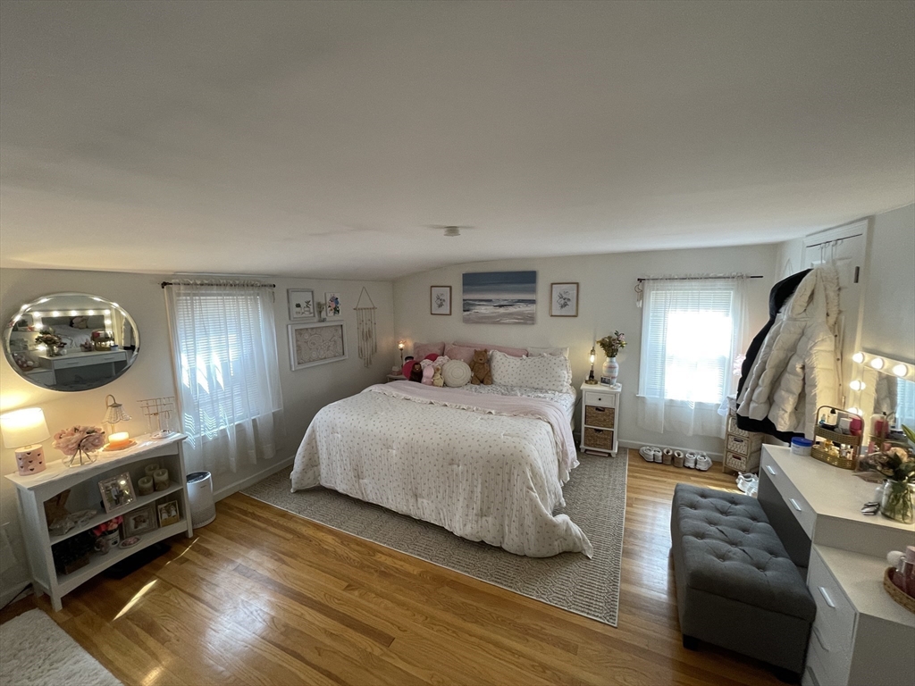 12 Hendricks Street Avon, MA 02322 - Photo 16 of 19 a bedroom with a bed and a couch