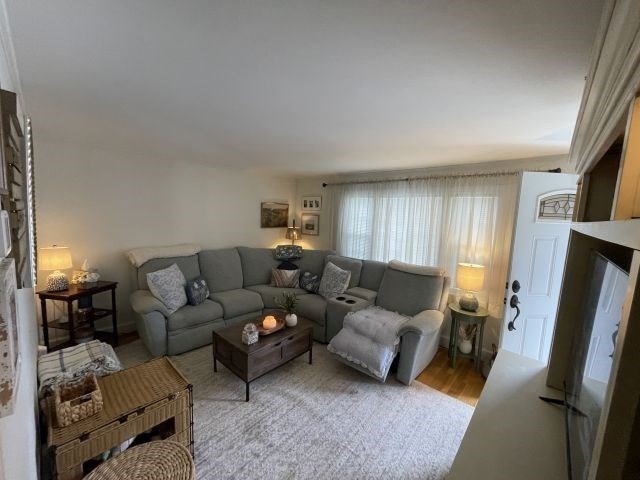 12 Hendricks Street Avon, MA 02322 - Photo 7 of 19 a living room with furniture and a couch
