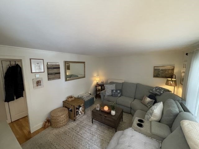 12 Hendricks Street Avon, MA 02322 - Photo 8 of 19 a living room with furniture and a window