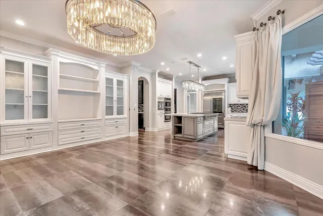 a view of a living room and entry way
