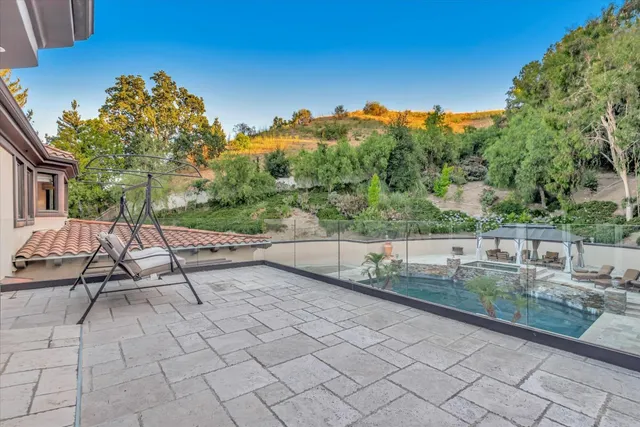 a view of a terrace with sitting area