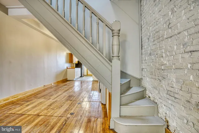 a view of entryway with wooden floor