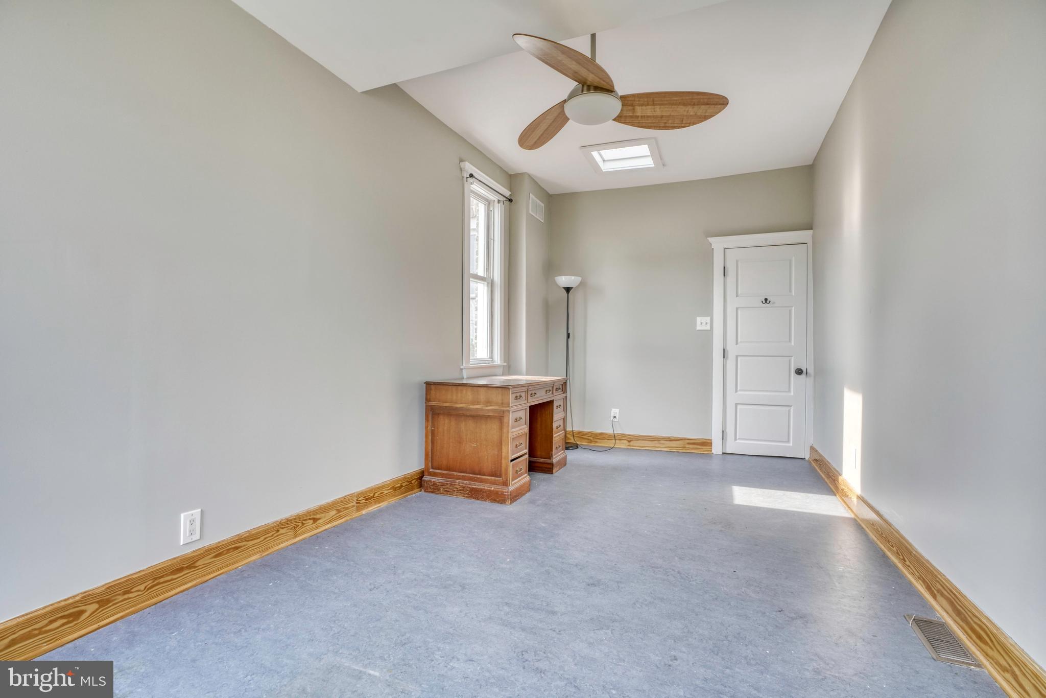 343 East 21st Street Baltimore, MD 21218 - Photo 17 of 22 a view of an empty room with a window