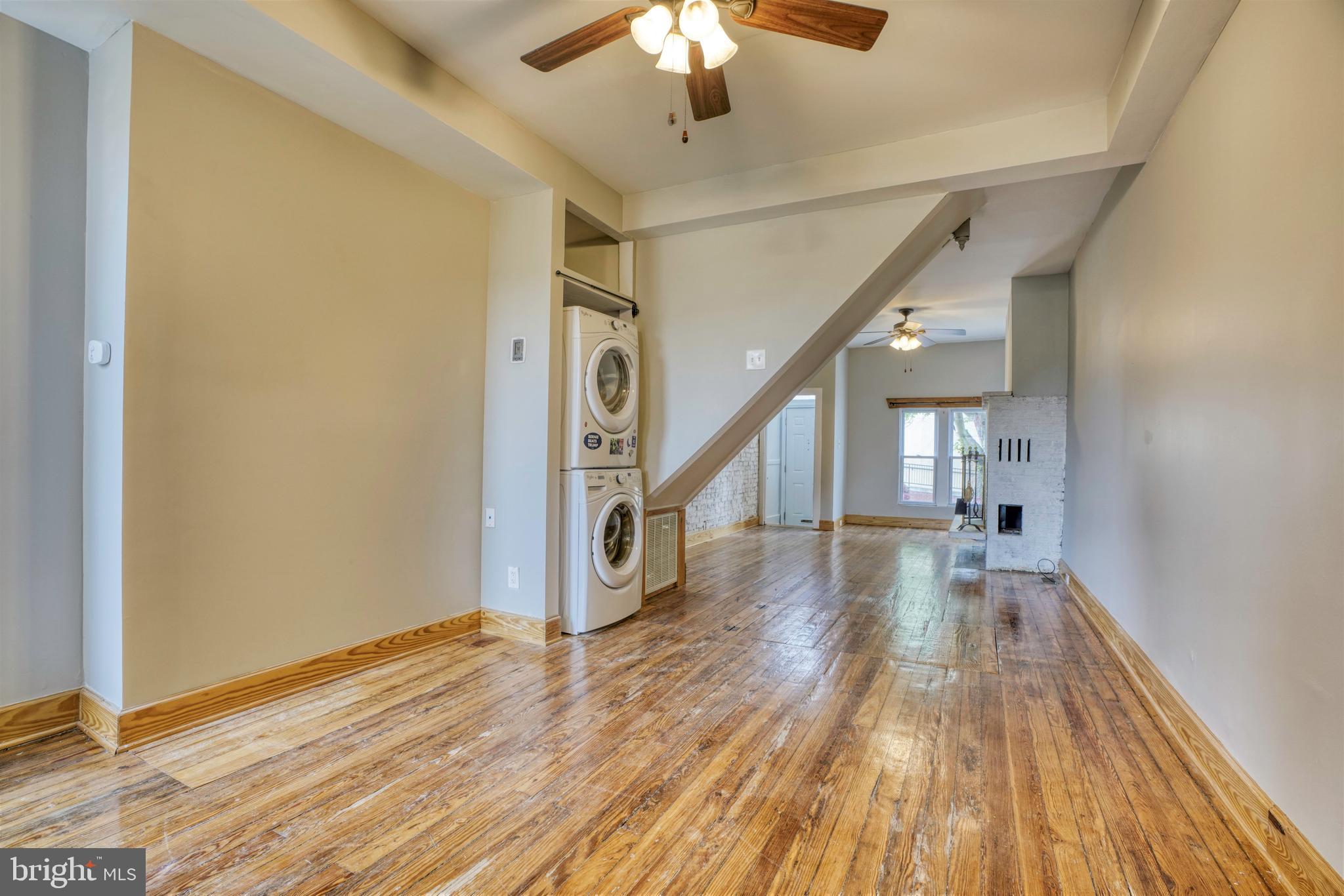 343 East 21st Street Baltimore, MD 21218 - Photo 2 of 22 a view of entryway and hall with wooden floor