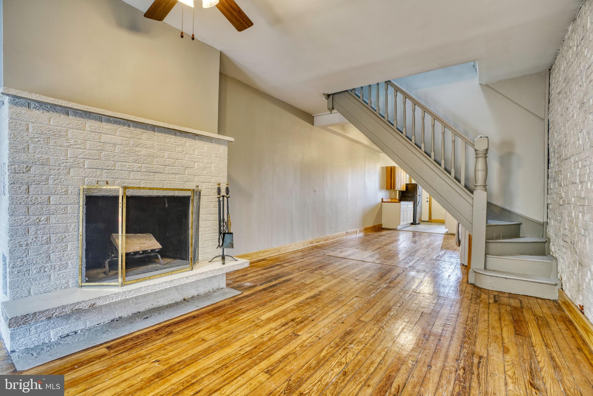 343 East 21st Street Baltimore, MD 21218 - Photo 3 of 22 a view of entryway and hall with wooden floor